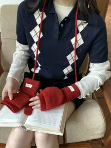 Red knitted fingerless flip-top gloves with long neck strap, cozy winter warmth for women.
