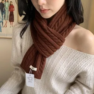 Women brown wool cable knit scarf for winter. Thick warm retro fashion neck warmer apparel.