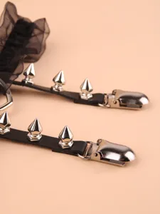 Black lace leather garter belt metal spike thigh ring detail view close up sexy accessory