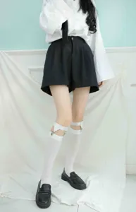 White Japanese JK uniform stockings with leg garter clips, cute high tube socks for women.