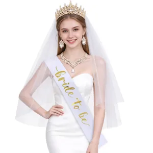 Parure de bijoux diademe voile collier boucles doreilles et echarpe pour fete de mariage.