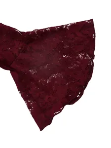 Burgundy lace long sleeve dress detail, exquisite floral pattern fabric texture for women.