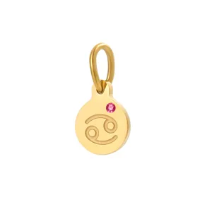 Close-up detail of the stainless steel gold zodiac Cancer pendant with pink birthstone.