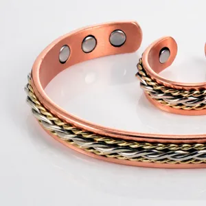 Ensemble bracelet et bague tressés magnétiques en cuivre pur, design ouvert réglable élégant.