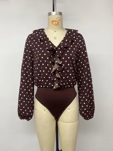 Detailed view of the brown polka dot ruffle V-neck long sleeve bodysuit showcase.