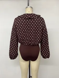 Women's long sleeve polka dot bodysuit with ruffled collar, commuter style shirt bodysuit back view.