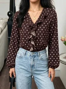 Women's V-neck long sleeve polka dot ruffle bodysuit commute fashion apparel detail view.