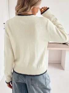 Women casual knit cardigan with scalloped trim long sleeve sweater back view fashion detail shot.