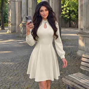 Elegant off-white mini qipao dress featuring long sleeves, stand collar and chic cutout design.