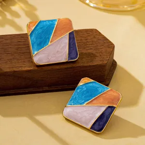 Boucles d'oreilles carrées géométriques abstraites avec design de blocs de couleur chic