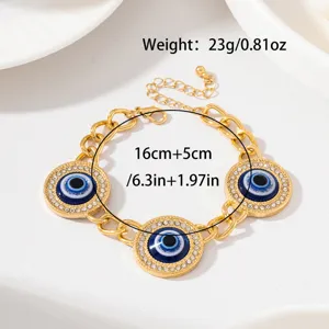 Bracelet breloques mauvais œil doré avec strass longueur réglable bijoux mode