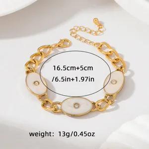 Bracelet ovale en email retro avec strass et chaine en or epaisse pour style elegant quotidien.