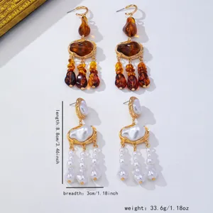 Boucles d'oreilles pendantes style bohème en résine ambre et perles pour femmes élégantes