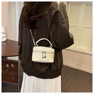 Mini quilted white leather crossbody bag, elegant top handle chain vanity purse for women.