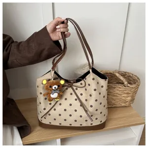 Borsa a tracolla a pois con fiocco e ciondolo orsetto dolce, perfetta per la moda autunnale.