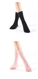 Close up of women five toe yoga socks with split toe design and anti slip cotton fabric.