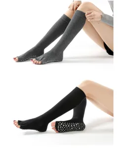 Knee-high yoga toe socks with anti-slip grip dots, warm and comfortable for dance fitness.