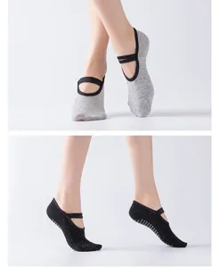 Detailed close-up view of anti-slip yoga socks with backless strap design for secure pilates workouts.