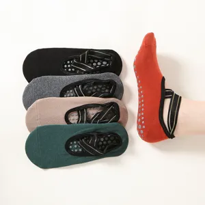 Women's non-slip yoga socks with metallic strap, ideal for fitness, dance, and pilates training.