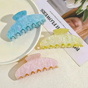 Sweet colorful hair claw clips for women, stylish large plastic shark clips for daily hair.