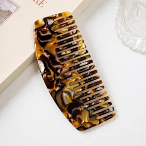 Acetate wide tooth hair comb, tortoiseshell marble pattern curved flat comb for styling.