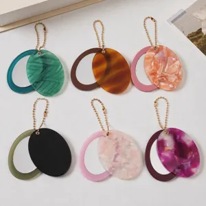 Modischer ovaler Spiegel Schlüsselanhänger mit Perlenkette, schöner Acryl Tasche Anhänger.