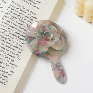 Detailed view of the Korean style 3D acetate flower hand cosmetic mirror with cute rose design.
