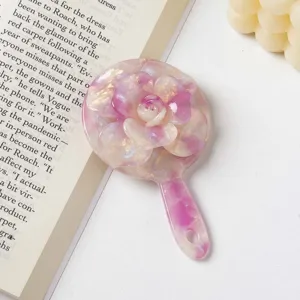 Korean style 3D rose makeup mirror close-up, portable pink aesthetic pocket mirror detail.