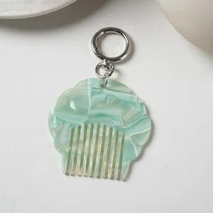 Portable mini acetate shell comb keychain, pearlescent marble pattern, cute bag pendant.