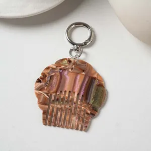 Mini acetate hair comb keychain, pearlescent marble bag pendant, portable chic accessory.