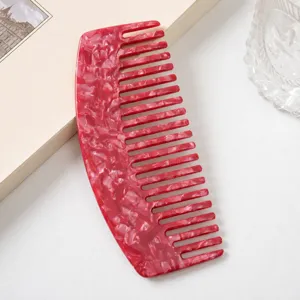 Red marbled acetate wide tooth hair comb, curved design for smooth daily hair styling.
