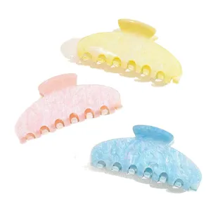 Set of three pastel hair claw clips in yellow pink and blue sweet simple shark clips for daily hair