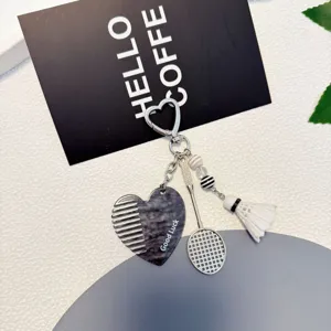 Pendentif porte-clés créatif raquette de badminton et peigne, charm de sac élégant et cadeau.