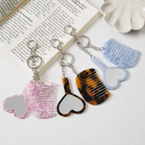 Cute acetate heart comb and mirror keychain set, stylish bag charm and car pendant.