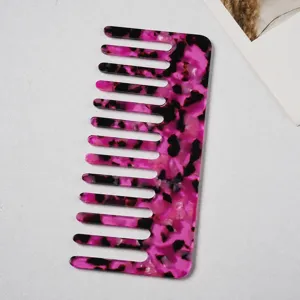 Acetate wide tooth hair comb with pink marble pattern anti-static daily hair styling tool.