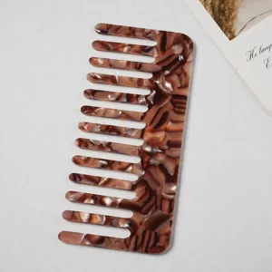 Acetate wide tooth hair comb with stylish tortoise shell pattern, anti static design for use.