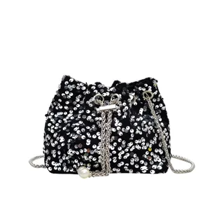 Black sequin bucket bag with silver chain and pearl pendant for women fashion evening party.