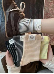 Cute striped mid-tube cotton socks with adorable puppy label, perfect for casual daily wear.