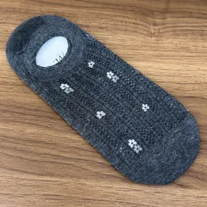 Detail view of dark grey floral mesh boat socks, lightweight and breathable for summer wear.