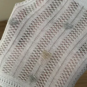 Close-up detail of lightweight mesh breathable women boat socks with cute floral knit pattern.
