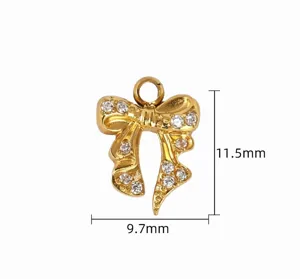 Gold rhinestone bow pendant detail, sparkling crystal charms, DIY necklace jewelry accessory.