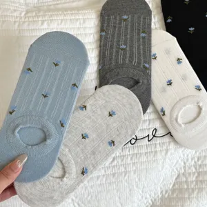Detailed shot of Korean style floral low cut invisible socks, breathable summer thin fabric.