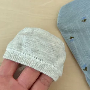 Detail shot of women's low-cut boat sock showing anti-slip silicone heel grip and breathable fabric.
