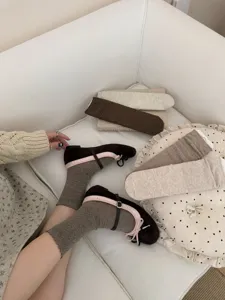 Vintage brown lace mid-calf socks for women, ballet style hollow diamond lettuce edge design.