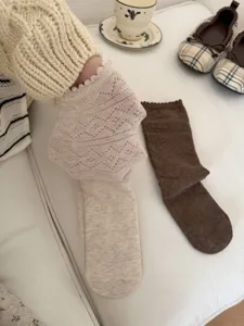 Korean style vintage hollow diamond lace mid-tube women socks with cute ruffle edge design.