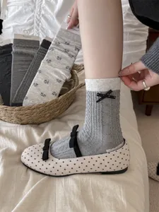 Vintage grey knit crew socks for women featuring cute black bow detail, sweet style cotton.