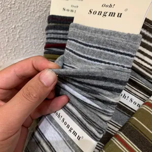 Comfortable Korean style contrast striped mid-calf socks for women, perfect for daily wear.