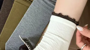 Women mid-calf socks with contrast frilly top, ribbed knit design, sweet retro daily wear.