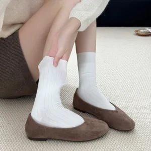 Korean style ribbed white mid-calf socks paired with brown flat shoes, elegant autumn main view.