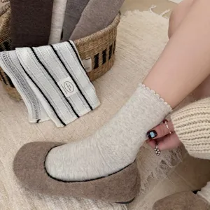 Retro brown ruffle mid-tube socks for women, cozy knitted ballet style daily hosiery.